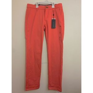 A flawless, classic look with Tommy Hilfiger rolled hem chinos.